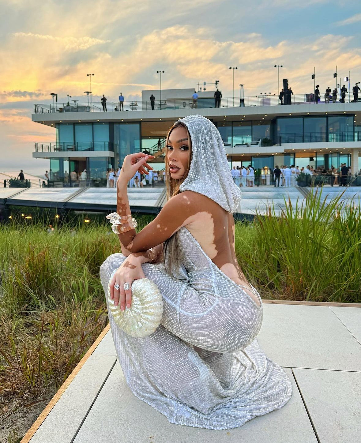 Winnie Harlow carries the 'Kahala' to the Michael Rubin White Party, Hamptons NY