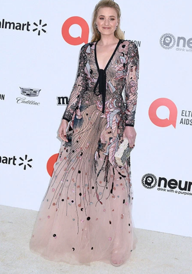 AJ Michalka carries the 'Wynwood' bag to the Elton John AIDS Foundation Oscar Viewing Party in Los Angeles