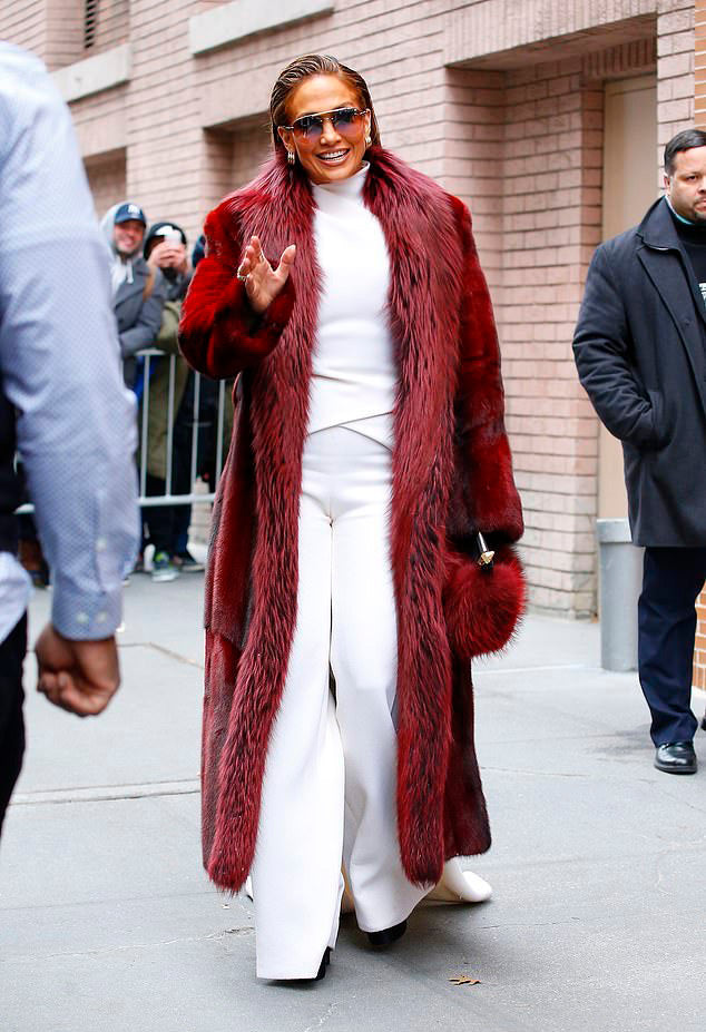 Jennifer Lopez carrries the 'Majorelle' clutch while in New York doing press for her film Second Act.
